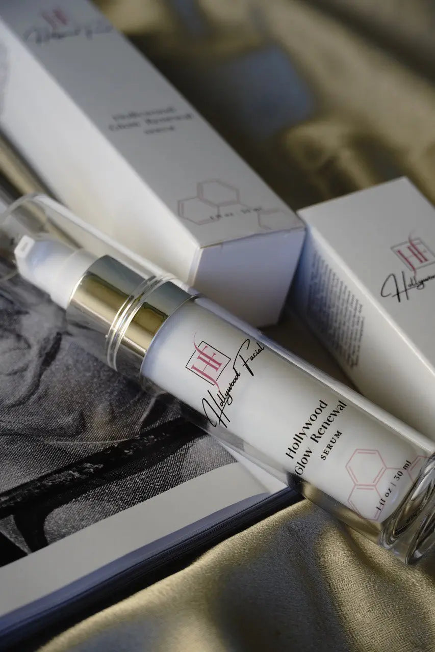 Skincare serum bottle of Hollywood Facial with packaging on a textured surface